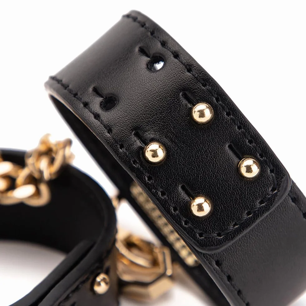 Giocattolo di coppia in pelle, cinturino regolabile con catena dorata, polsino con gancio, accessorio per gioco di ruolo, nero