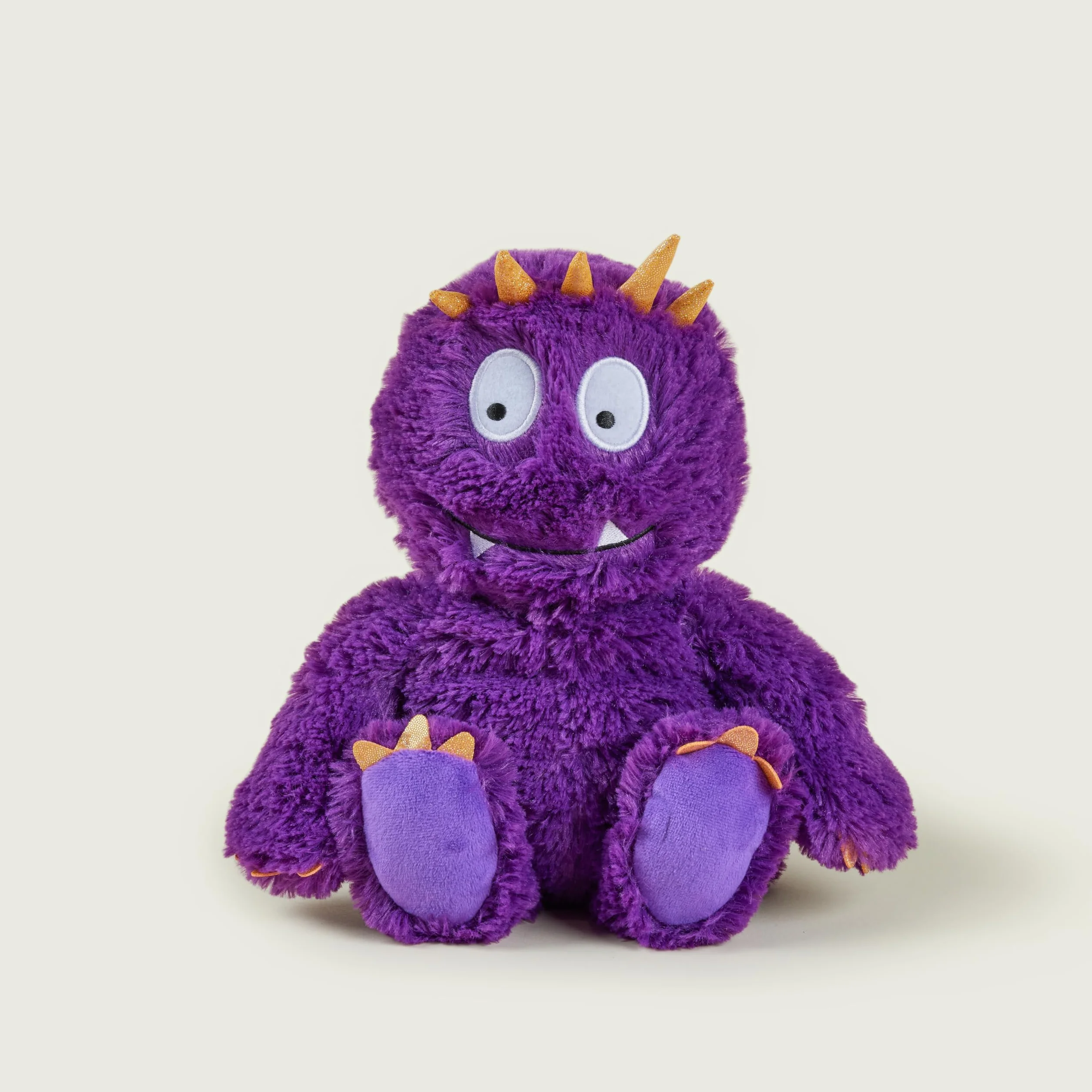 Warmies Peluche Mostro Viola Brillante, Pesato Utilizzabile nel Microonde con Profumo di Lavanda Francese, Borsa di Grano Caldo o Freddo per un fresco relax e un caldo sollievo