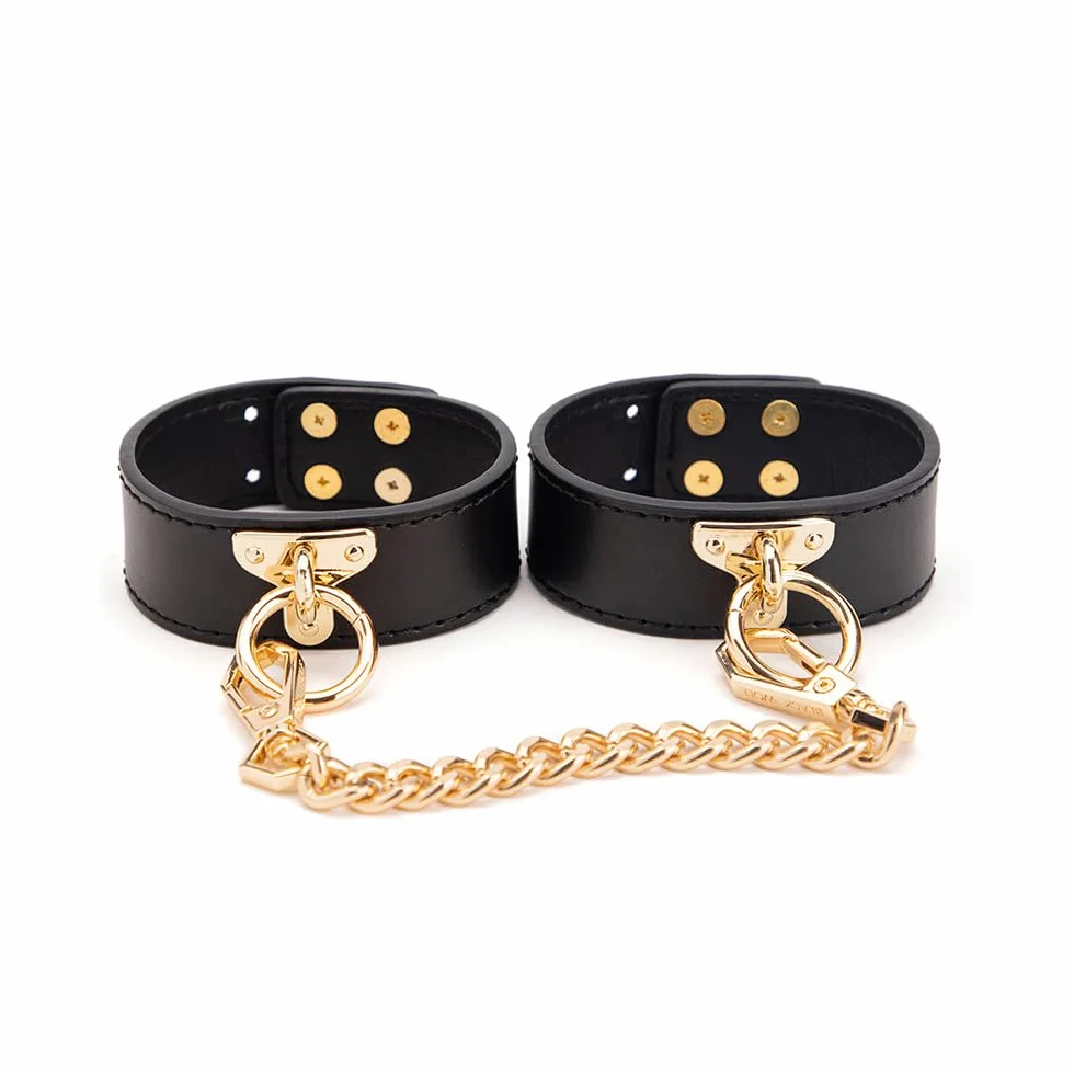 Giocattolo di coppia in pelle, cinturino regolabile con catena dorata, polsino con gancio, accessorio per gioco di ruolo, nero